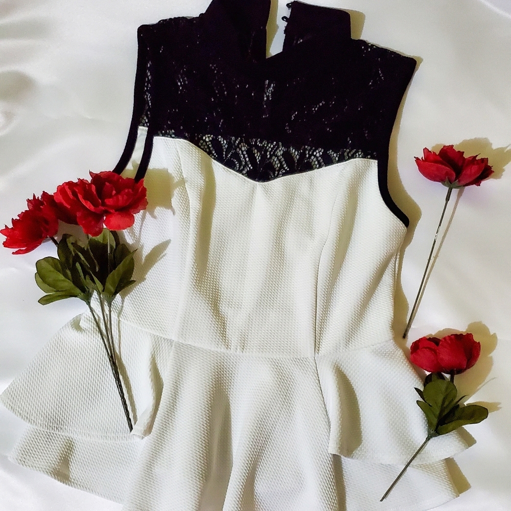 White sleeveless blouse